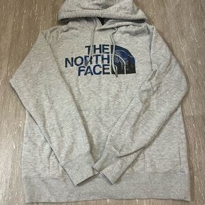 The North Face Women’s Light Gray Hoodie with Blue Logo